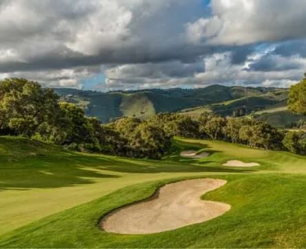 Approach to a green on the Gene Bates-redesigned Carmel Valley Ranch course — strategy and placement over length, classic Dye philosophy.