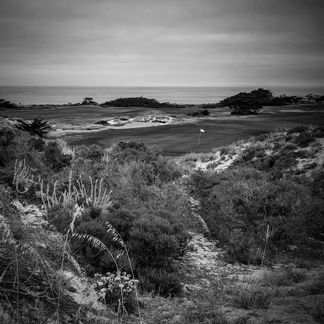 Windswept dunes remind you that Jack Neville understood links golf. The ocean spray is part of the experience.