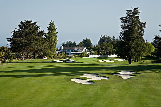 The famed 16th hole — a short par 4 that punishes the aggressive tee shot with a ravine short of the green.