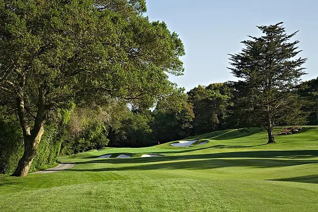 Views across the Santa Cruz Mountains from the upper holes — rare inland elevation for a MacKenzie layout.