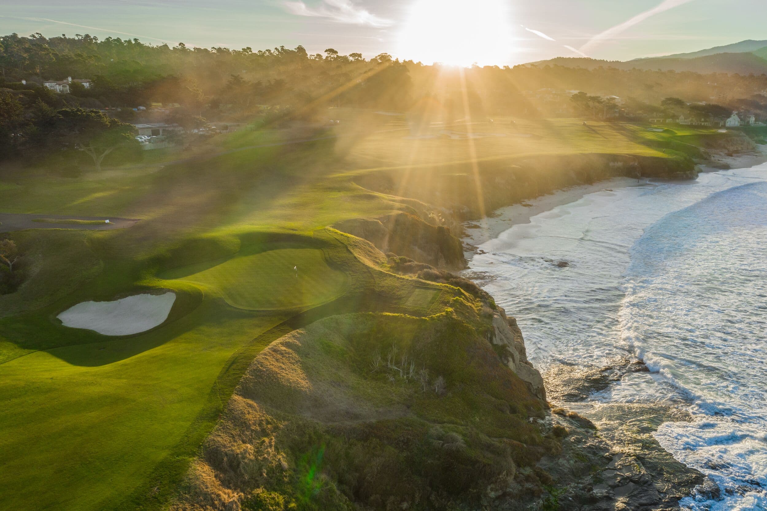 Monterey Peninsula golf courses — aerial view of the California coast at golden hour