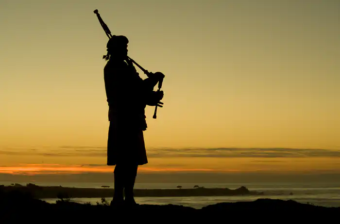 Each evening at dusk, a bagpiper plays on the 18th hole as the sun sets over the Pacific — a Pebble Beach Resorts® tradition unique to Spanish Bay.